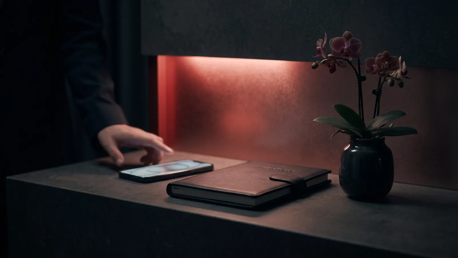 Clinic front desk at night with a phone lighting up with an incoming message